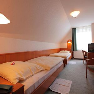 Zimmer mit zwei Einzelbetten